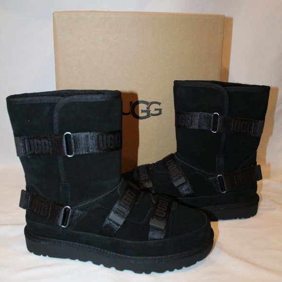 NIB UGG WOMEN'S SUEDE STRAP MOTO CLASSIC SHORTS BOOTS BLACK‎ - Picture 1 of 9